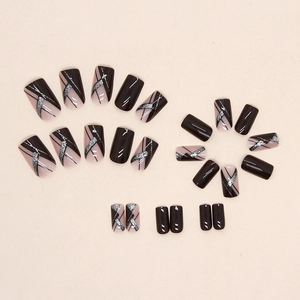 Short square press-on nails featuring black and pink geometric glitter line designs