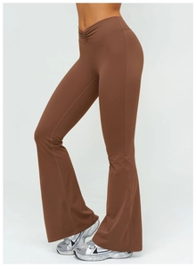 Close-up of V-shaped crossover high waistband on dark brown yoga flare pants