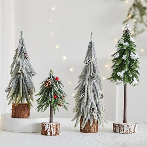 Mini artificial snowy Christmas trees with pine cones and wood base for home decor
