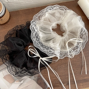 Chic black and white lace organza hair scrunchies with elegant ribbon bow accents
