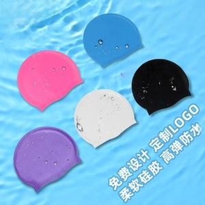 Waterproof silicone swim caps in five colors displayed on water ripple background