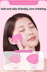 Detail of pink heart facial sponge showing expansion from thin dry state to 8mm wet thickness