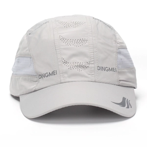 Detail view of quick-dry baseball cap featuring breathable side mesh and laser-cut holes