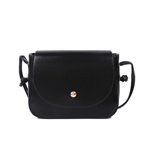 Minimalist black leather crossbody bag for women with elegant golden metal ring buckle