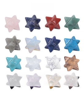 Macro display of sixteen diverse hexagonal Merkaba energy crystals with polished surfaces