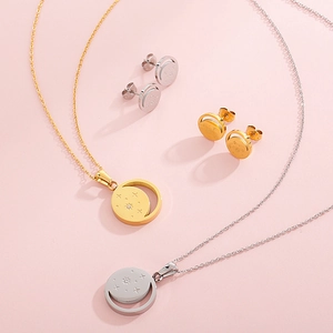 Titanium steel jewelry set featuring celestial star and moon pendant necklace and earrings