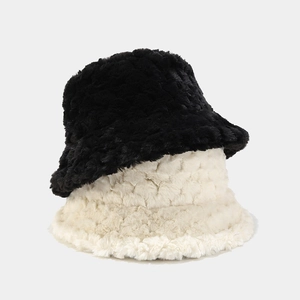 Winter faux fur bucket hats in black and beige with warm fluffy texture for women
