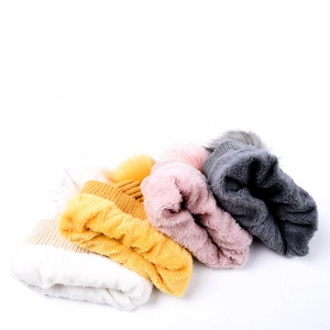 Warm knit beanie with pom-pom and fleece lining for women in multiple colors