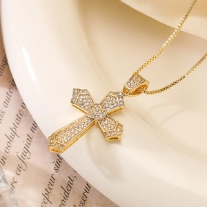 18K gold plated cross necklace with heart center and clear zircon stones on a chain