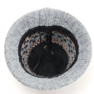 Women's grey knit bucket hat with diamond rib pattern and leopard print lining