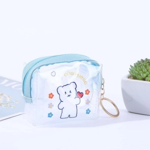 Detail of square PVC coin purse featuring a cute white bear and blue zipper closure