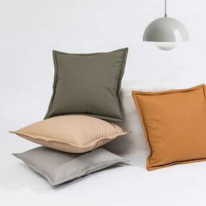 Artistic stack of plush faux rabbit fur plaid throw pillows in multi-color options