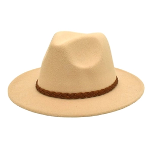 Close-up of beige wool fedora hat featuring a brown braided leather band decoration