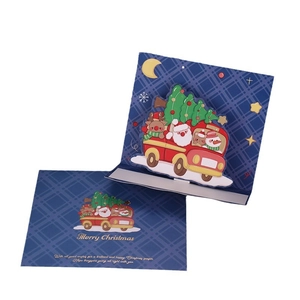 3D pop-up Christmas card set featuring a red truck with gold foil envelopes on white background