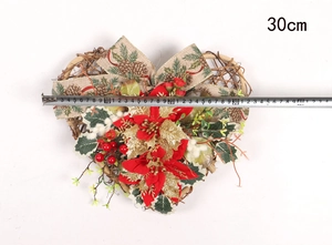 30cm heart-shaped Christmas wreath with red poinsettia and berries on grapevine base