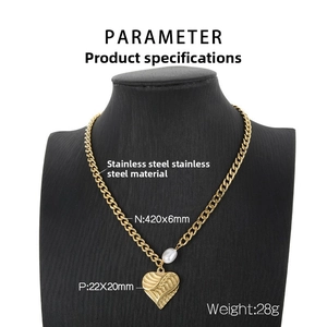 Detail of a double-layer stainless steel heart necklace with a white freshwater pearl