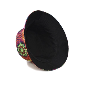 Fashionable reversible bucket hat with vibrant gradient floral print and solid black lining