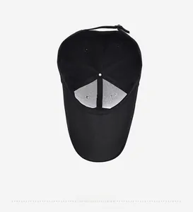 Detail showing the inner structure, reinforced seams, and adjustable buckle of a black baseball cap