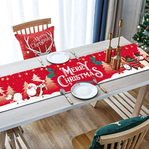 Macro view of Christmas table runner with Merry Christmas text and festive patterns