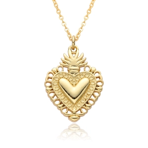 Detailed view of an ornate 18K gold plated heart pendant with intricate crown motifs
