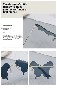 Detailed macro view of butterfly shaped sunglasses with gold metal temples and blue lenses