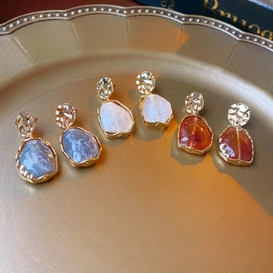 Irregular resin oval earrings with hammered gold metal base in three vintage colors