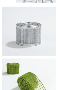 Detail of sheer Christmas ribbons with glitter stripes and gold dots for holiday decor