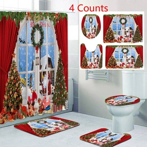 Detail showing the 4-piece Christmas bathroom set with Santa shower curtain and non-slip mats