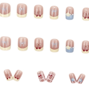 Sweet press-on nail set with white pearls, 3D flowers, cherries, and bow tie designs