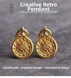 Macro shot of S925 sterling silver gold-plated retro circular pendants with detailed relief
