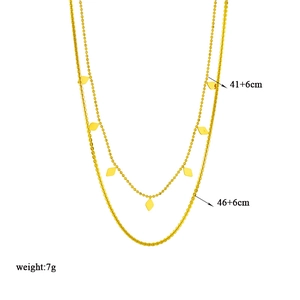 Collier double rang doré avec pendentifs losanges, longueurs 41+6cm et 46+6cm, poids 7g