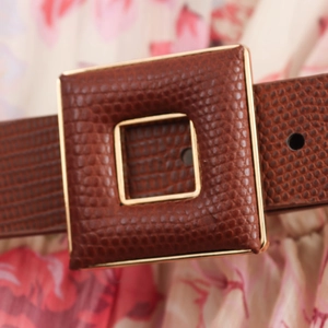 Elegant floral chiffon dress featuring a brown leather belt with a square metal buckle