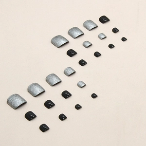 Classic black and glitter silver press-on toe nails set featuring 24 pieces of glossy finish