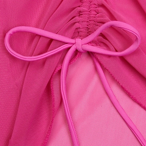 Detailed macro view of hot pink mesh fabric with drawstring ruching and a small bow tie
