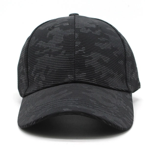 Detail shot of black washed baseball cap showing subtle camo texture and rib fabric