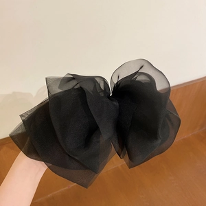 Elegant large black organza bow hair clip with layered tulle design for minimalist style