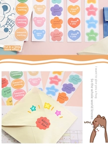 Macro shot of assorted colorful cartoon puppy stickers for gift sealing and decoration