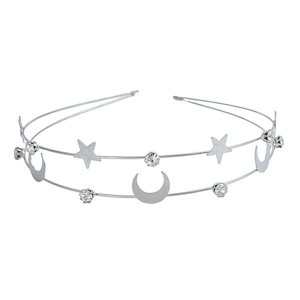 Close-up of silver double-layered metal headband with star moon and crystal details