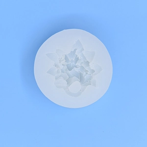 Flower pattern silicone mold for cake and chocolate on light blue background