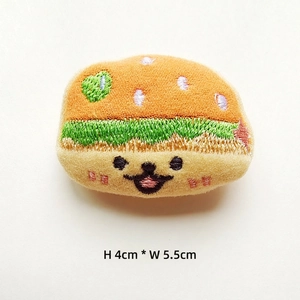 Miniature plush burger charm featuring detailed embroidery, sized 4cm by 5.5cm for accessories
