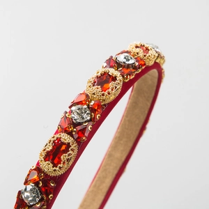 Elegant red satin headband with vintage crystals and gold metal setting for luxury parties