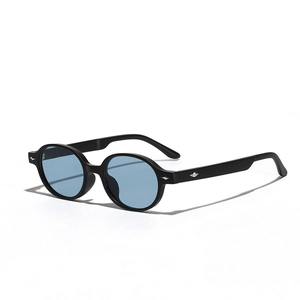 Retro round black sunglasses with light blue lenses and silver diamond metal rivets