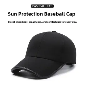 Detail of black baseball cap showing six-panel crown and reinforced brim stitching