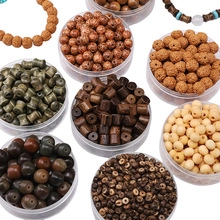 Macro view of assorted baroque gold-painted beads for DIY jewelry and hair accessories