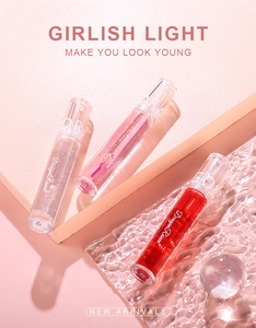 Three-piece mirror water lip gloss set in transparent, pink gold, and clear red shades