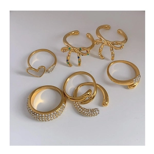Gold stainless steel rings set featuring heart bow designs with colorful zircon stones