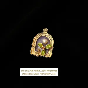 Macro view of vintage gold arch pendant with purple enamel and white pearl detail