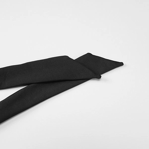 Close-up of black woven fabric straps with sharp-angled ends for the halter neck dress