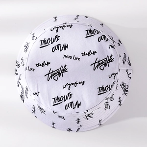 White cotton bucket hat with black graffiti print and street style lettering design