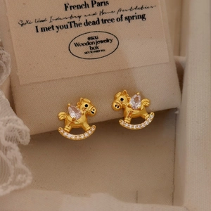 Gold plated rocking horse earrings with sparkling teardrop zircon and pavé crystals